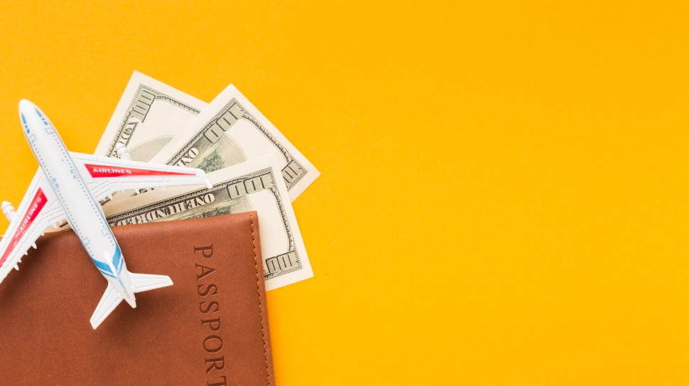 top-view-passport-money-with-copy-space